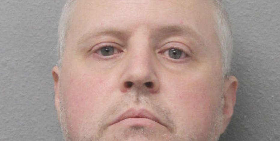 Houston firefighter charged with possession of child