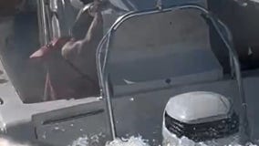 Watch: Four saved from sinking boat in Georgia inlet
