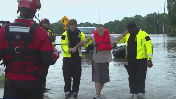 Houston flooding: New Caney man rescued from high water with his 2 dogs