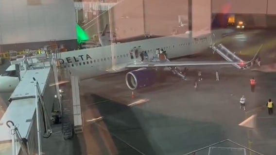 Delta passengers evacuate plane after small fire breaks out at Sea-Tac