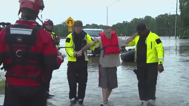 Houston flooding: New Caney man rescued from high water with his 2 dogs
