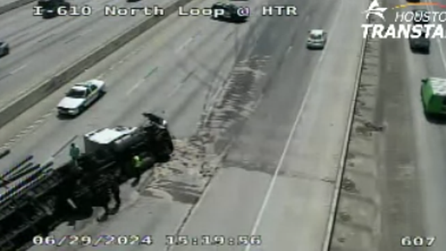 Hazmat spill on I-610 North Loop at Hardy Toll, truck overturned
