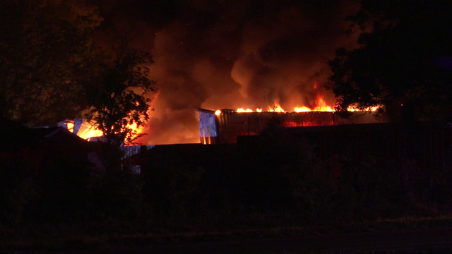 Rosenburg fire: Firefighters shuttle water amidst blaze at three story warehouse
