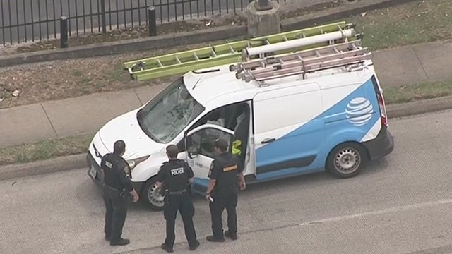 Houston crime: HPD officer hit by AT&T van while on duty