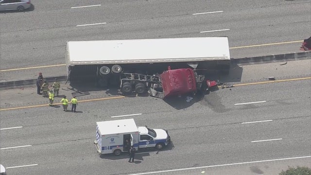 I-10 East 18-wheeler accident: Multiple lanes closed after truck turns over