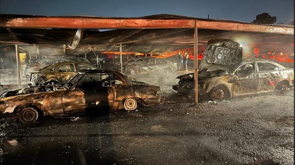 VIDEO: Uptown apartment fire destroys nearly 30 cars