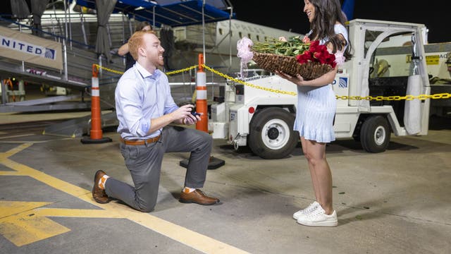 Couple gets engaged in heartwarming airport proposal with help from United Airlines