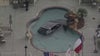 Car crashes into Houston hotel pool