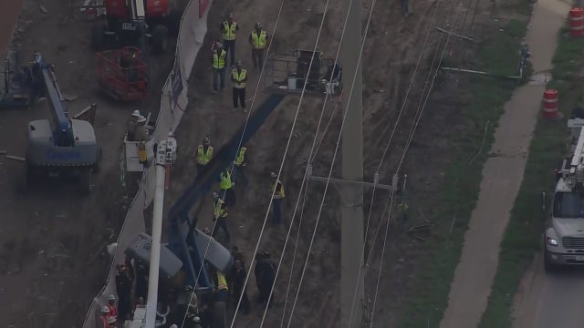 Houston fire responds to machine touching live wire at construction site