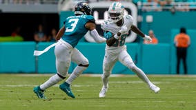 Miami WR DuBose taken off the field on a stretcher after hit to the head against Texans