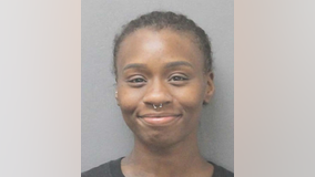 Mom arrested after child found with bottle of wine at Houston apartment