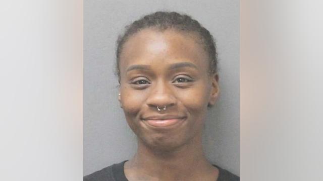 Mom arrested after child found with bottle of wine at Houston apartment