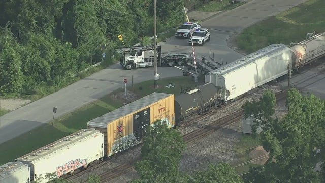 Train crashes into 18-wheeler on West Hardy Road; crews at the scene