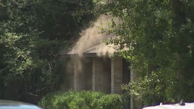 Kingwood SWAT scene: Barricaded suspect sets fire on Shadow Rock Drive; deceased person found inside