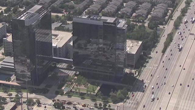 Houston-based ConocoPhillips says it will lay off up to 25% of its workforce