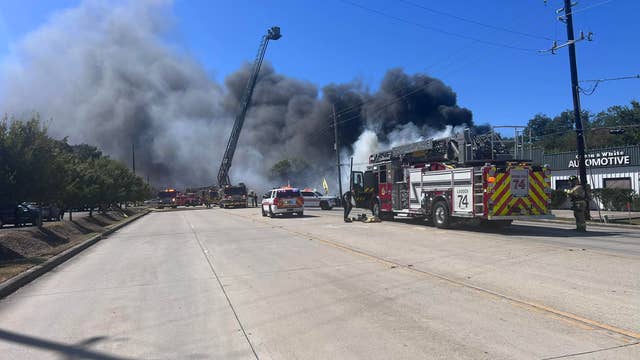 Spring road closed following large fire near North Freeway