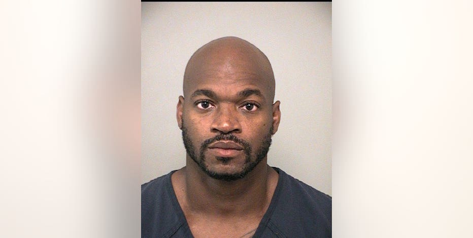 Former NFL star Adrian Peterson arrested in Sugar Land, records show