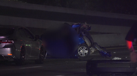 Woman killed in multi-car crash on North Freeway after driving with flat tire