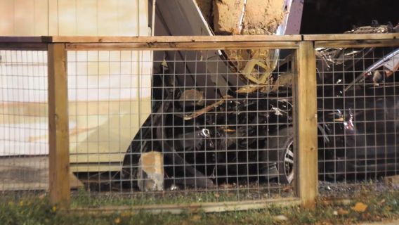 Woman dead after car crashes into building in Greater Heights area