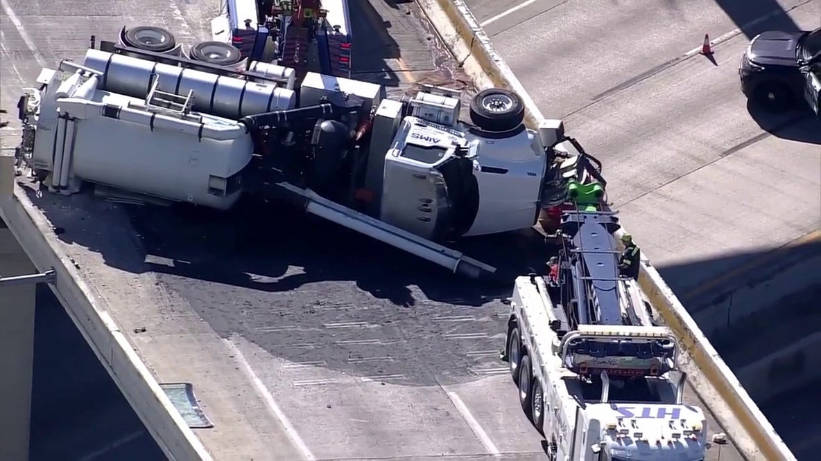 Houston crash: 18-wheeler rolls over on ramp between I-69, I-610