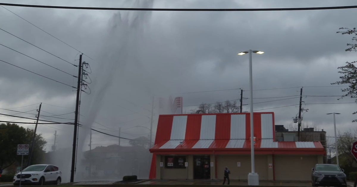 Water main break gushes water feet into air outside Houston Whataburger