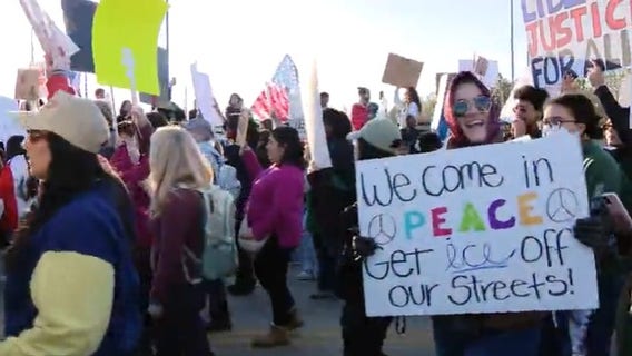 Demonstrators march through Montrose in "ICE out of Houston" protest for immigration reform 