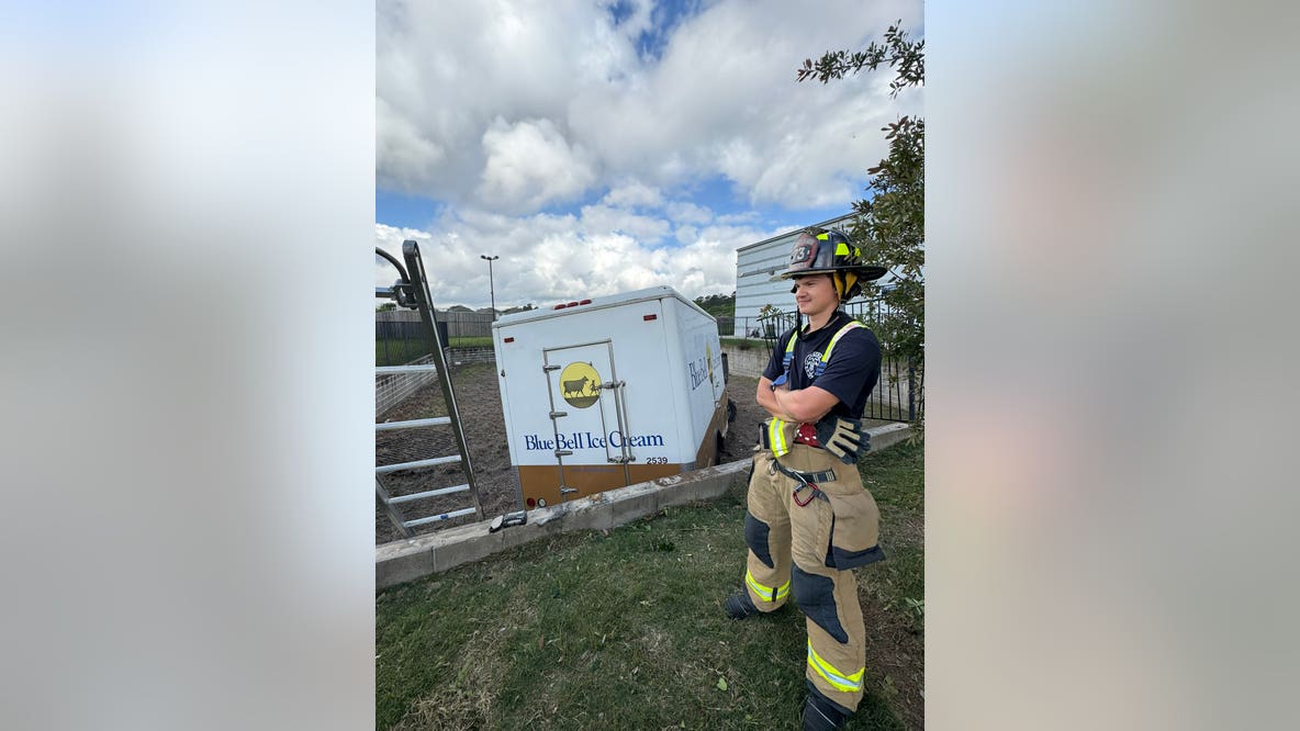 Blue Bell truck crashes through gate and into detention pond in Spring