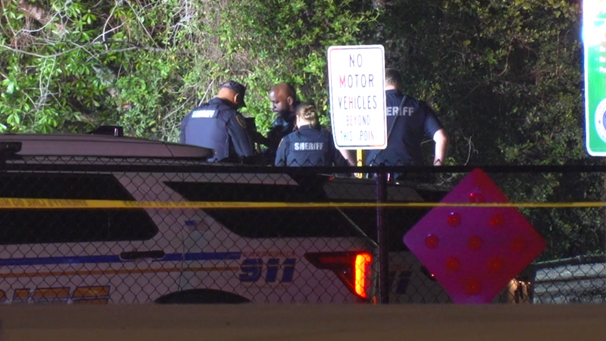 Driver fleeing police crashes into woods in north Harris County, killing two in fiery crash