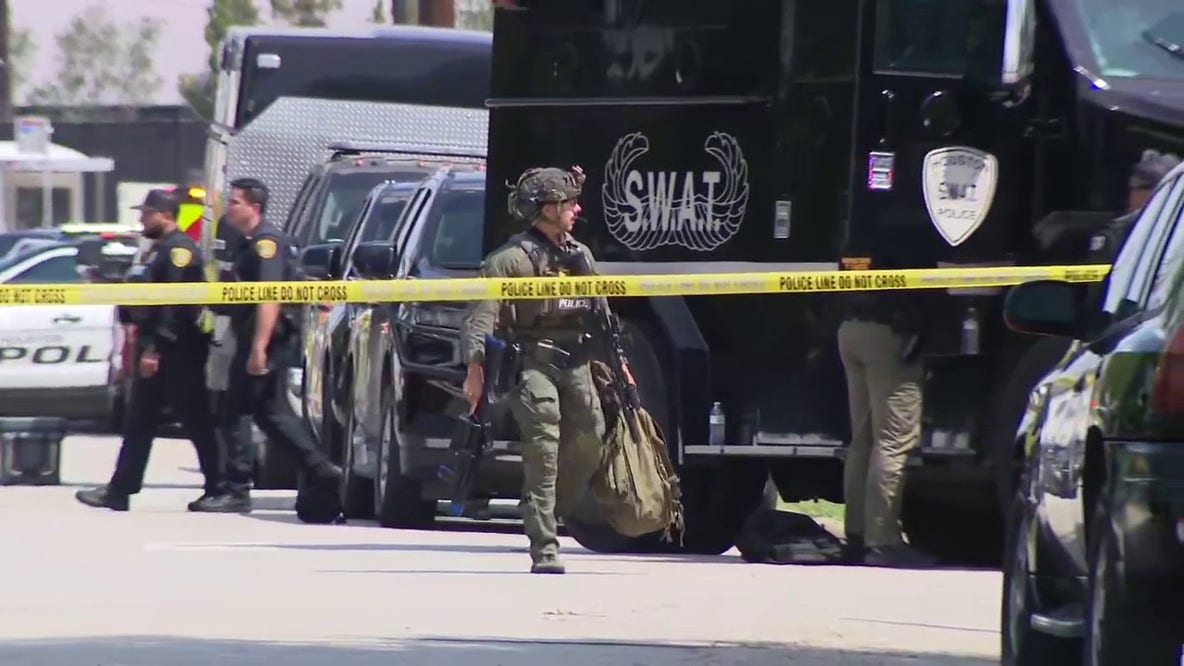SWAT: Suspect in custody after 4-hour long standoff, Long Academy in 'secure mode'