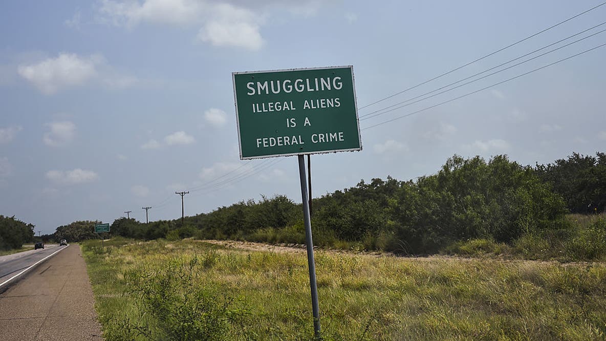 Oklahoma trucker charged after 42 migrants found locked in hot tractor-trailer at Texas checkpoint