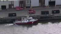 Woman rescued from ship channel near Port Houston