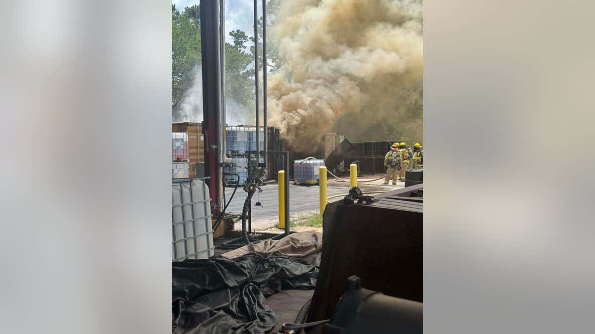 Firefighters battling container fire in Conroe