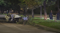 1 dead after vehicle crashes, catches fire on Memorial Drive; 1 injured