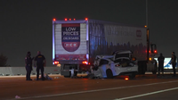 Woman killed after car slams into stalled 18-wheeler on Houston South Loop