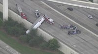 Houston traffic: 18-wheeler falls from Katy Freeway near SH-99