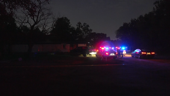 Unidentified woman found dead outside vacant trailer in Harris County