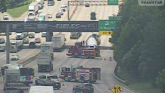 Traffic backup after 18-wheeler hits East Freeway bridge