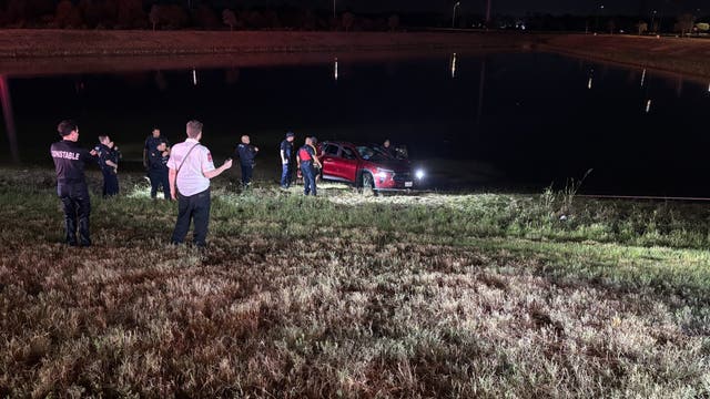 Driver rescued from retention pond in Spring after missing curve