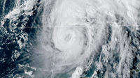 Isaias strengthens into Category 2 hurricane with 100-mph winds