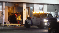 2 injured after stolen car crashes into southeast Houston store, catches fire