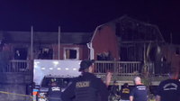 Hitchcock police investigating homicide after woman found dead in burned home