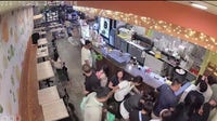 Surveillance video captures people running for safety after shooting in Houston's Chinatown