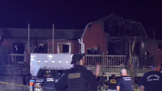 Hitchcock police investigating homicide after woman found dead in burned home