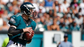 Wentz keeps Eagles in control of playoff hopes