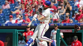 Harper, Realmuto power Phillies past Rockies 7-5 for sweep