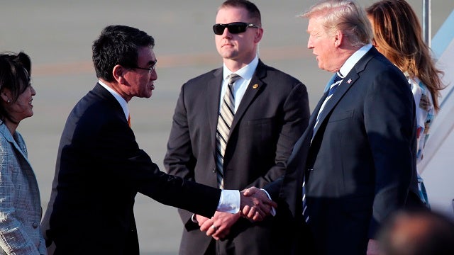 Trump opens state visit, needles Japan over trade issues