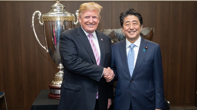 Trump breaks with Abe, says not bothered by NK missile tests