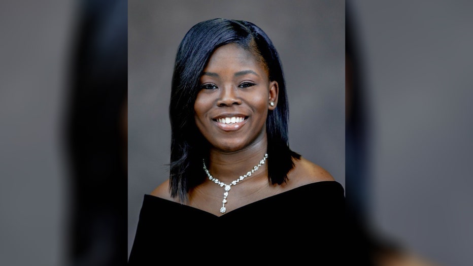 Lamyrical Harris smiles in school image.