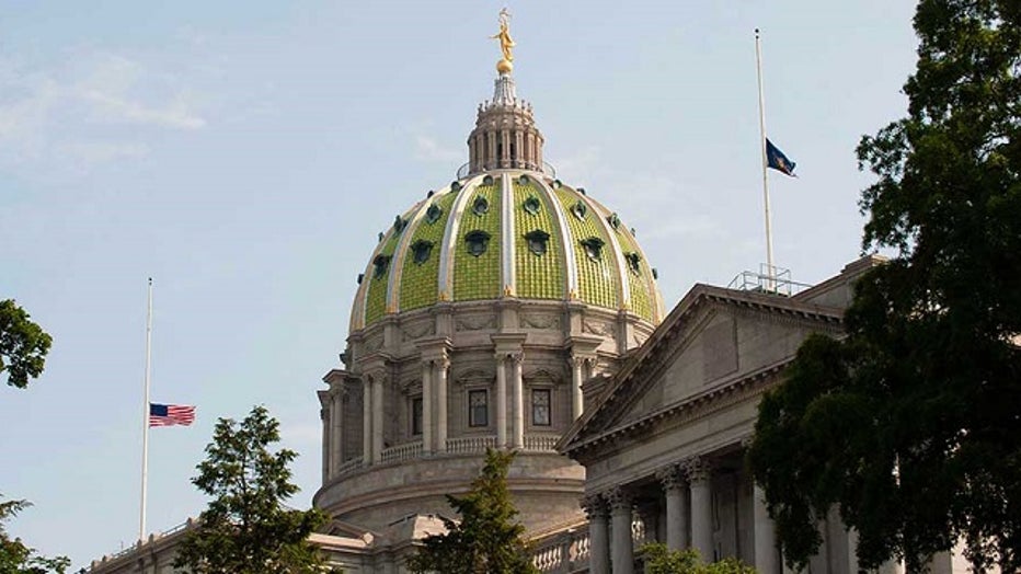 A flag flies at half-staff in Pennsylvania's capitol
