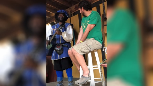 A minstrel proposes at the Georgia Renaissance Festival